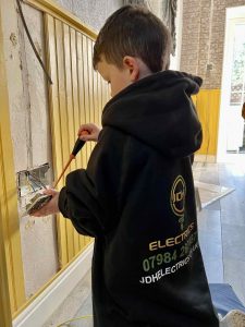 Young electrician practicing skills