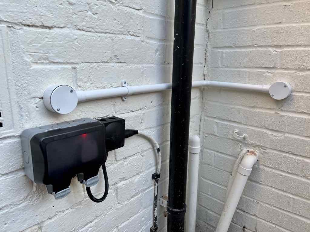 Conduit wiring with outside socket